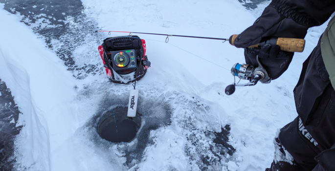 a person ice fishing