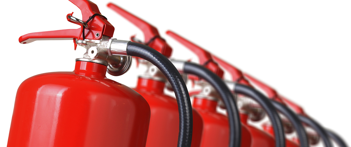 Fire extinguishers lined up in a row