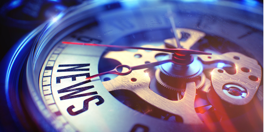 news printed on a clock