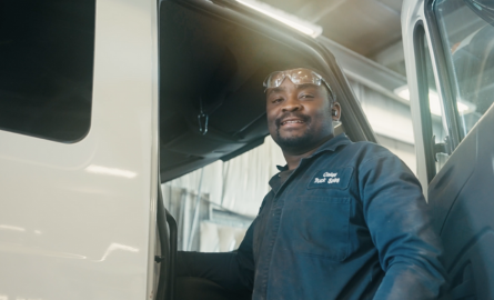 a man working to repair a vehicle