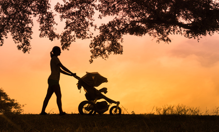 Woman pushing stroller