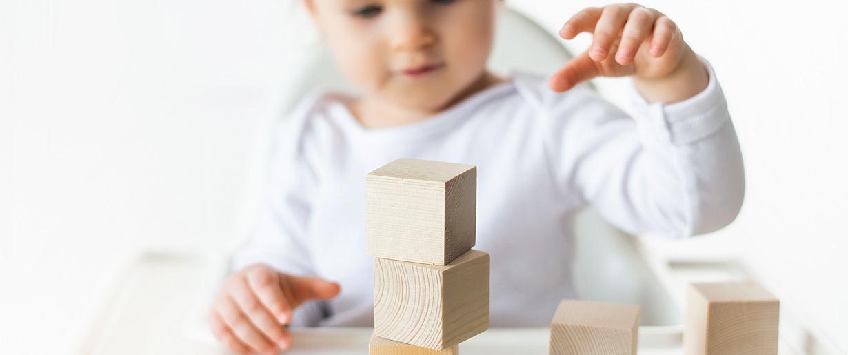 child playing with blocks