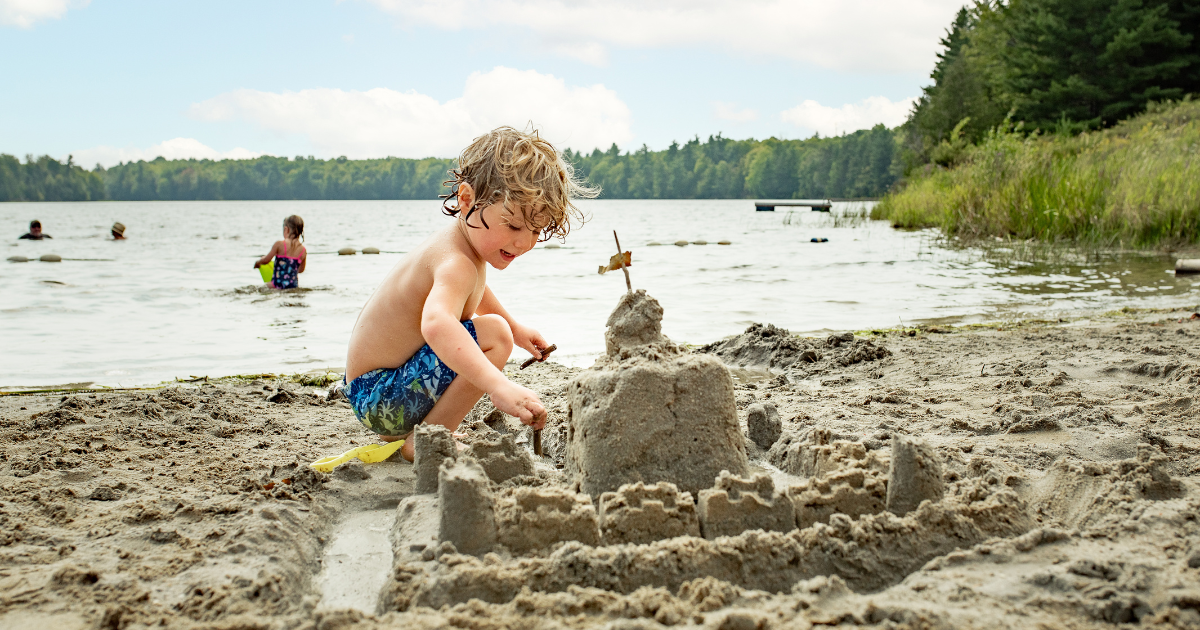 child building a sand castle