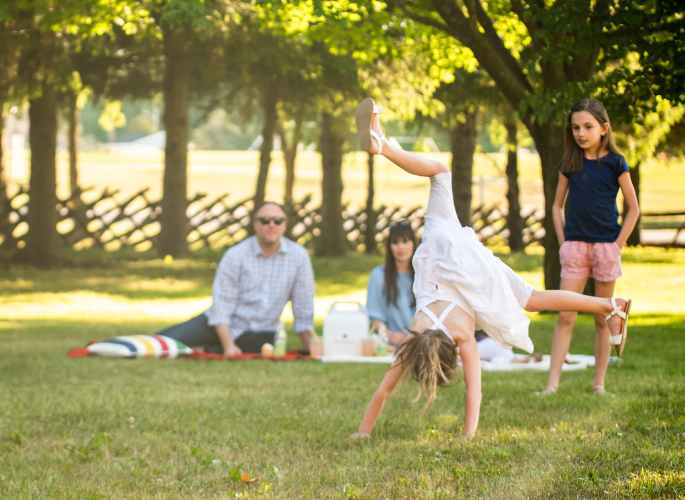 a family having a picnic in a park 