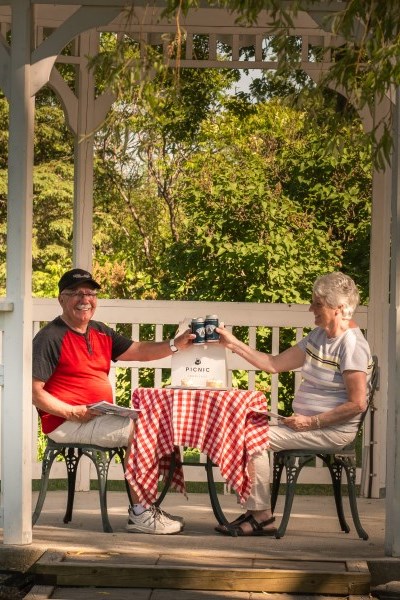two people picnic in a park