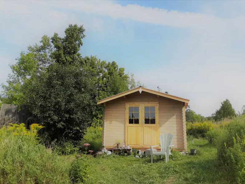 a wooden house in a farm