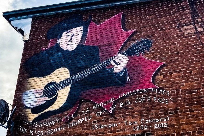 A Mural depicting a man playing guitar