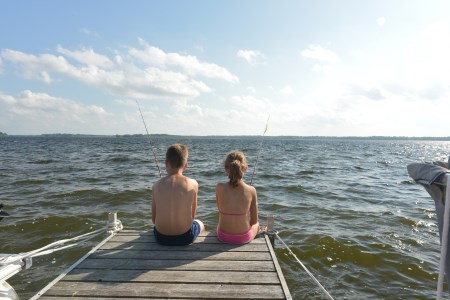 two children fishing 