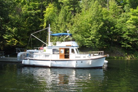 a white boat on a lake