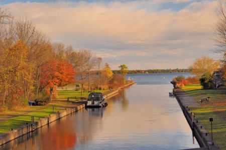 a river with trees in the fall