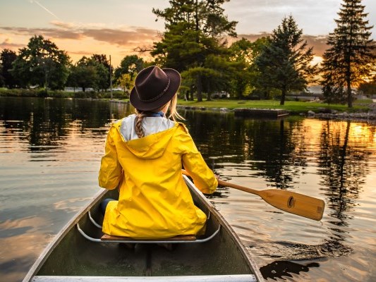 a girl boating in a park