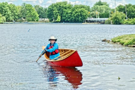one woman paddling on water