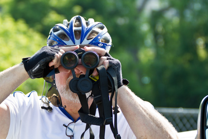 A birdwatcher on a bike