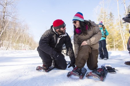 Two people snowshoeing in the winter 