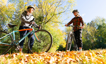 two women with bicyles