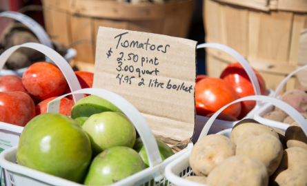 colourful tomatoes in baskets